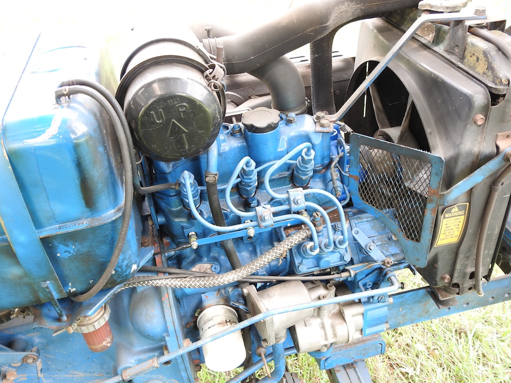 A barn find blue 1980's Ford 1210 compact tractor - Image 22 of 38