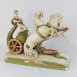 A Royal Dux figure with chariot,