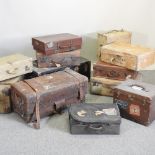 A collection of 19th and early 20th century vintage luggage,