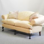 A Wesley Barrell Marlborough three seater sofa, with rose gold damask upholstery,