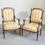 A pair of 18th century style continental yellow upholstered open armchairs