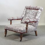 A Victorian floral upholstered armchair