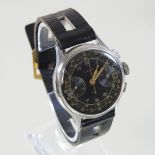 A World War II era German Urania military chronograph wristwatch, having a signed black dial,
