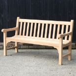 A teak slatted garden bench,