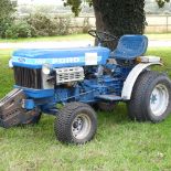 A barn find blue 1980's Ford 1210 compact tractor