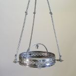 A chrome circular pierced metal chandelier,
