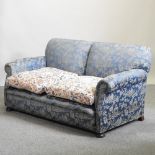 An early 20th century blue upholstered sofa,