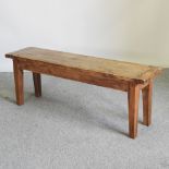 A rustic pine bench,