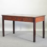 A George III mahogany partners writing table, with an inset top,