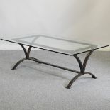 Tom Faulkner, contemporary, a hand made metal and glass coffee table, circa 1990's,