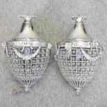 A pair of modern silver painted metal and glass ceiling lights, in the form of acorns,