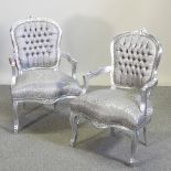 A pair of grey damask style upholstered show frame armchairs