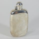 A Victorian silver hip flask, Sheffield 1894, of plain shape, with a hinged screw cover,