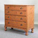 A continental antique pine chest of drawers,