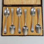 A matched set of six silver teaspoons, with bright cut decoration,