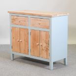 A stripped pine and turquoise painted cabinet,