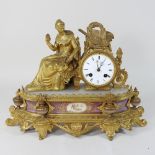 A gilt and marble mantel clock,
