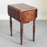 A Victorian mahogany work table,