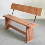 A stripped mahogany bench,