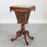 A Victorian walnut and marquetry ladies trumpet shaped workbox, with a fitted interior,