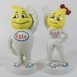 A pair of painted metal Esso money banks, 25cm high,