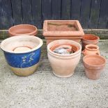 A collection of various garden pots,