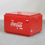 A vintage style red painted metal cola advertising cool box,