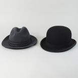 A gentleman's bowler hat, by Slater of London, size 7, together with a trilby, by Dunn,