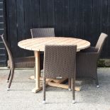 A teak circular garden table, 120cm diameter,