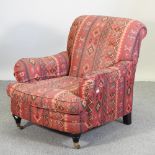 A modern Howard style armchair,