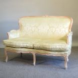 A French style pale yellow upholstered show frame sofa,