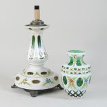 A Bohemian white and green overlaid glass table lamp and shade,