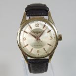 A 1960's Longines gold plated gentleman's automatic wristwatch, having a signed champagne dial,