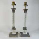 A pair of modern glass table lamps, in the form of columns,