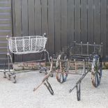 A mesh cot, on a cast iron stand, together with a garden planter in the form of a cart,