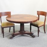 A 19th century mahogany breakfast table, with a circular top, on lion's paw feet, 114cm diameter,