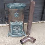 A French green and black painted stove, 95cm high,