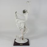 A Capodimonte figure of a girl dancing,