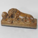 A 19th century Grand Tour carved wooden model of the 'Lion of Lucerne',
