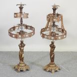 A pair of large gilt painted figural two tier table lamps,