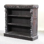 A 19th century heavily carved oak dwarf open bookcase,