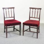 A set of five George III mahogany dining chairs,