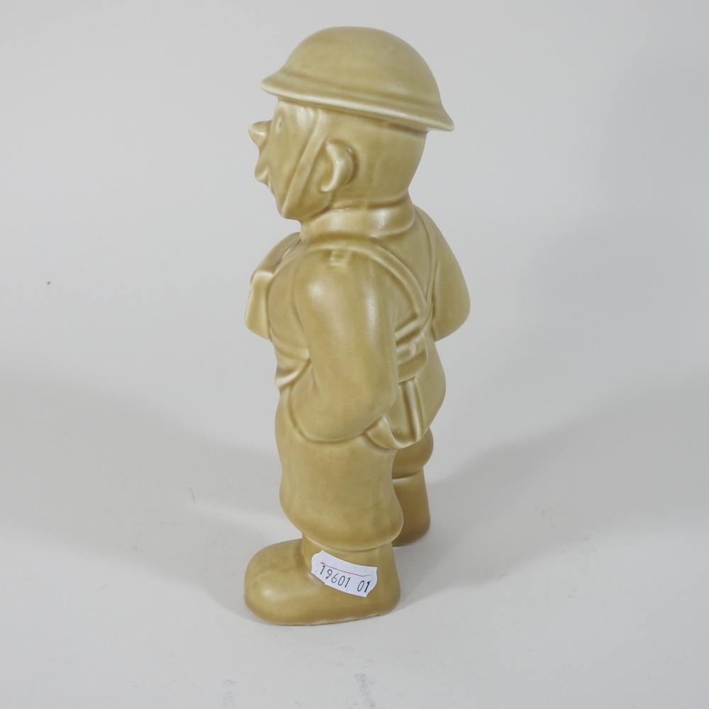 A Bovey Pottery 'Our Gang' figure of a World War II Fireman, - Image 3 of 7