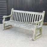 A wooden slatted garden bench,