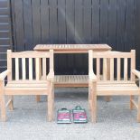 A pair of teak garden armchairs, with a cover, together with a teak potting table,