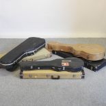 A collection of six various hard guitar cases,