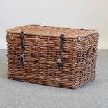 A vintage wicker linen hamper,