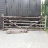A wooden five bar gate, 317cm,