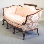 A 20th century pink upholstered sofa, of Georgian design,