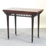 An Edwardian mahogany rectangular folding card table,